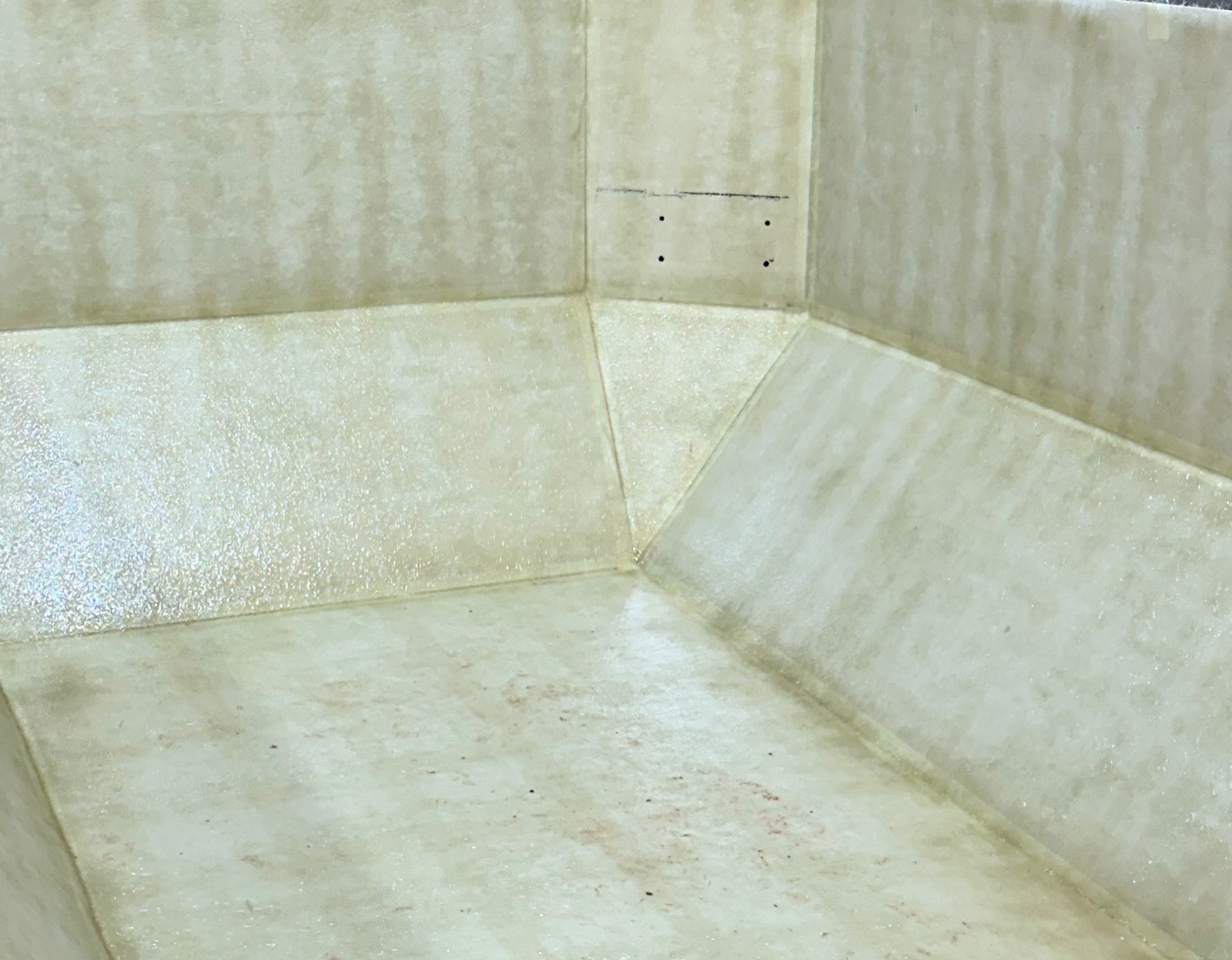 Hand-laminated fiberglass shell